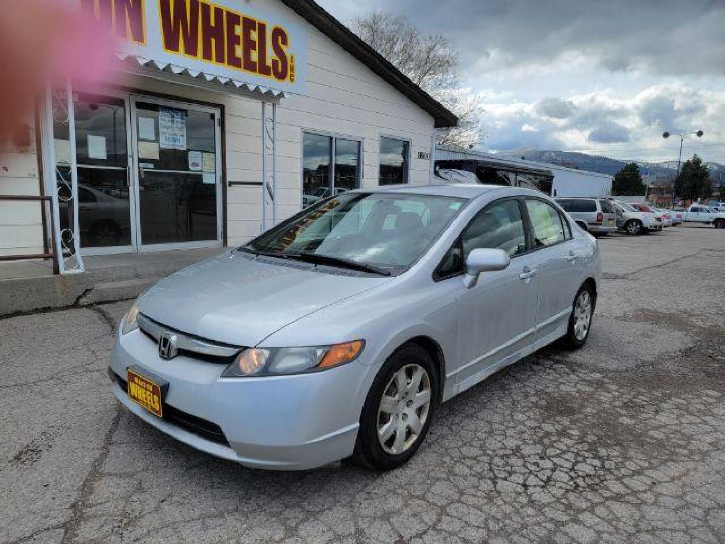 2007 Honda Civic LX Sedan AT (1HGFA16527L) with an 1.8L L4 SOHC 16V engine, 5-Speed Automatic transmission, located at 1800 West Broadway, Missoula, 59808, (406) 543-1986, 46.881348, -114.023628 - Photo#0