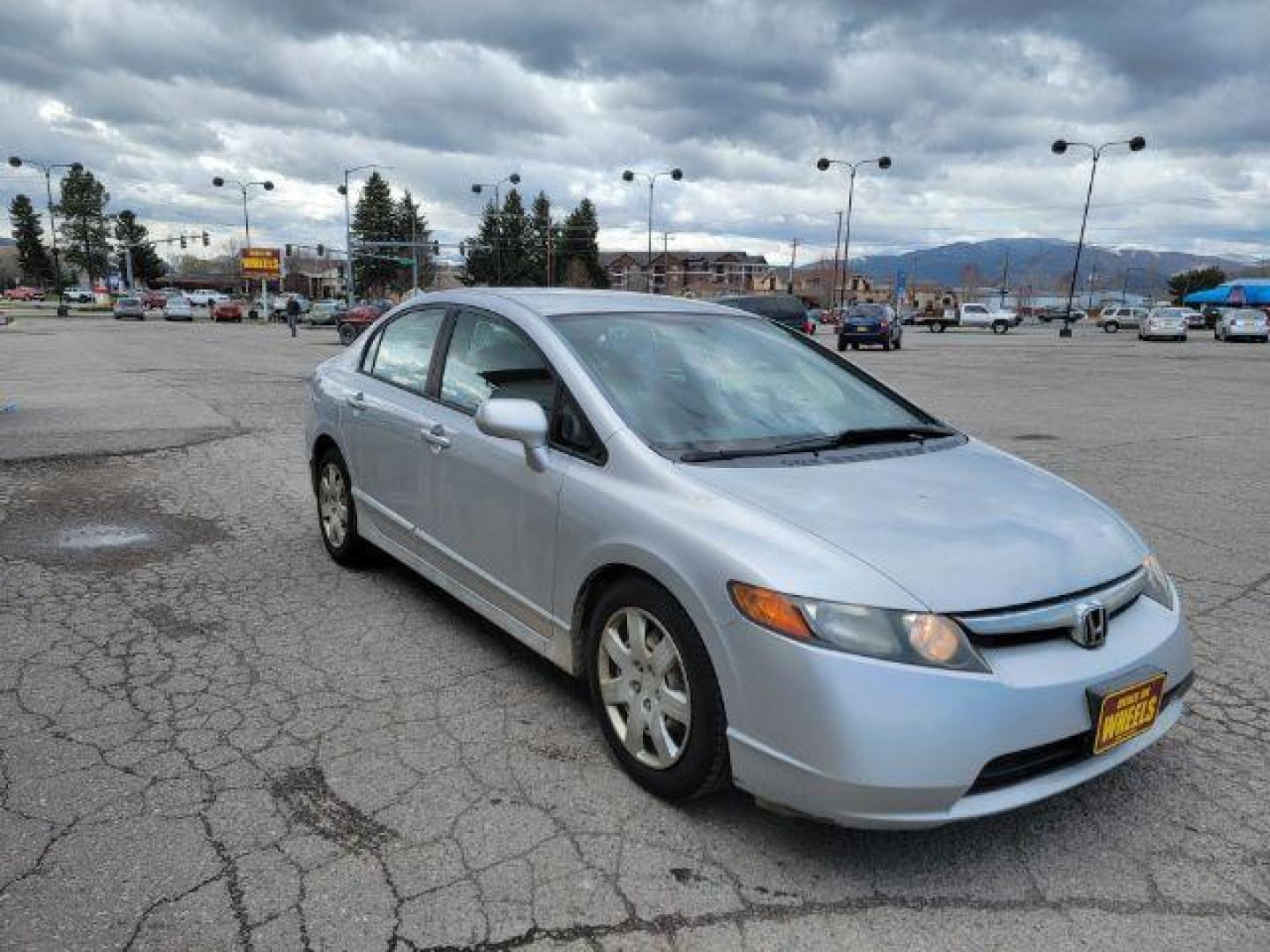 2007 Honda Civic LX Sedan AT (1HGFA16527L) with an 1.8L L4 SOHC 16V engine, 5-Speed Automatic transmission, located at 1800 West Broadway, Missoula, 59808, (406) 543-1986, 46.881348, -114.023628 - Photo#2