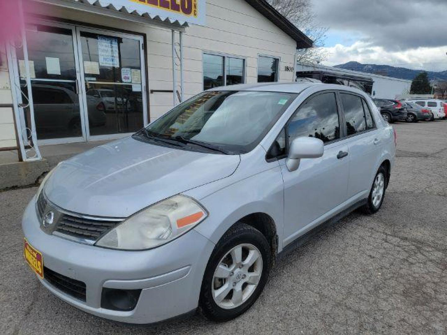 2009 Nissan Versa 1.8 S Sedan (3N1BC11E69L) with an 1.8L L4 DOHC 16V engine, located at 1800 West Broadway, Missoula, 59808, (406) 543-1986, 46.881348, -114.023628 - Photo#1