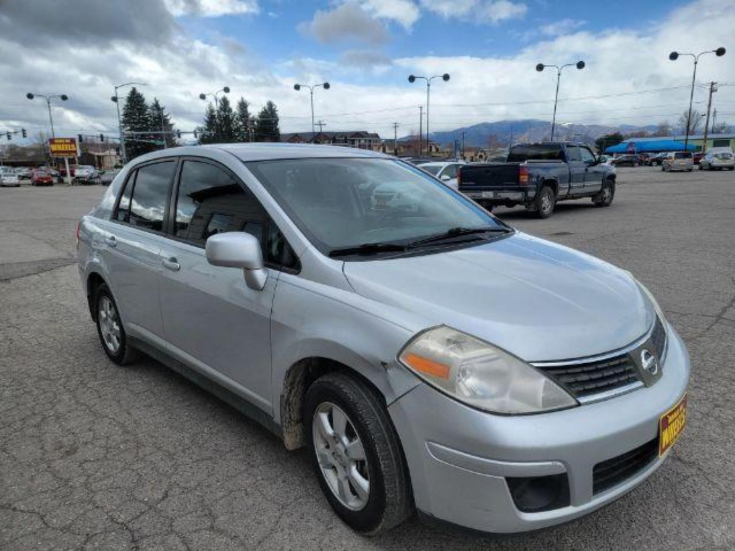 2009 Nissan Versa 1.8 S Sedan (3N1BC11E69L) with an 1.8L L4 DOHC 16V engine, located at 1800 West Broadway, Missoula, 59808, (406) 543-1986, 46.881348, -114.023628 - Photo#2