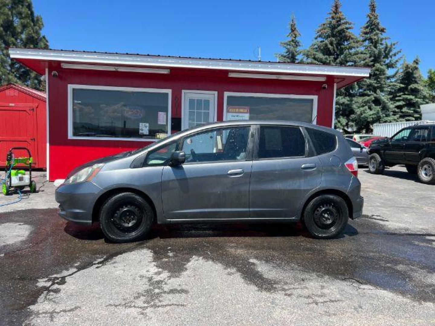 2012 Honda Fit 5-Speed MT (JHMGE8G34CC) with an 1.5L L4 SOHC 16V engine, 5-Speed Manual transmission, located at 601 E. Idaho St., Kalispell, MT, 59901, 48.203983, -114.308662 - Photo#1