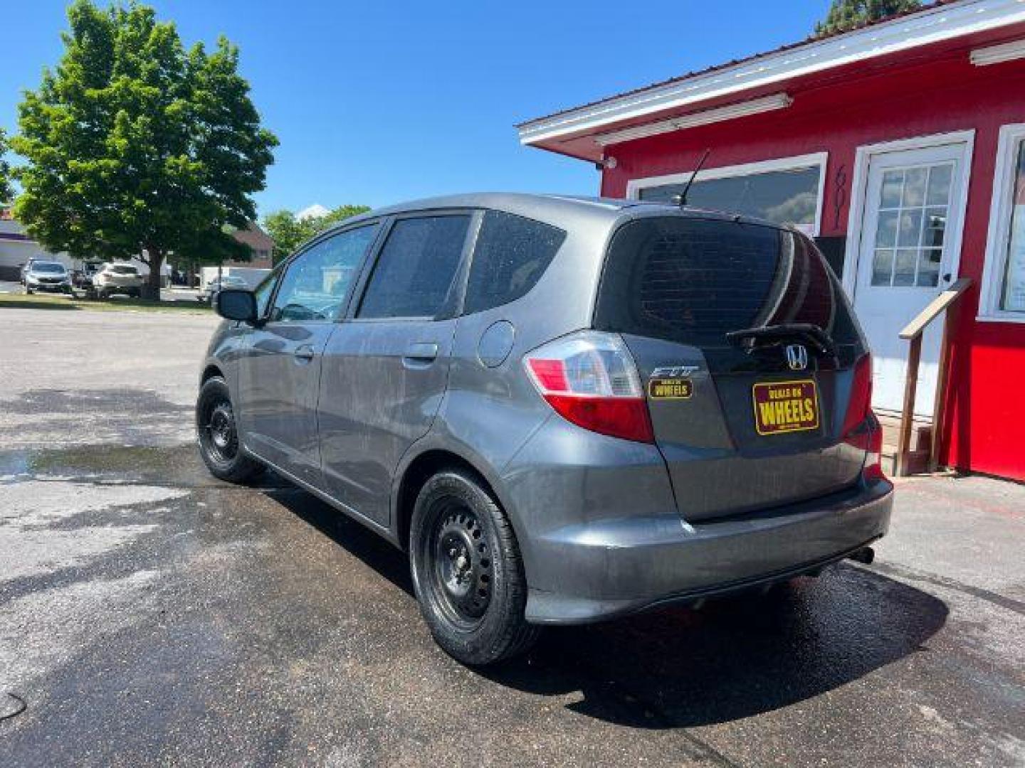 2012 Honda Fit 5-Speed MT (JHMGE8G34CC) with an 1.5L L4 SOHC 16V engine, 5-Speed Manual transmission, located at 601 E. Idaho St., Kalispell, MT, 59901, 48.203983, -114.308662 - Photo#2