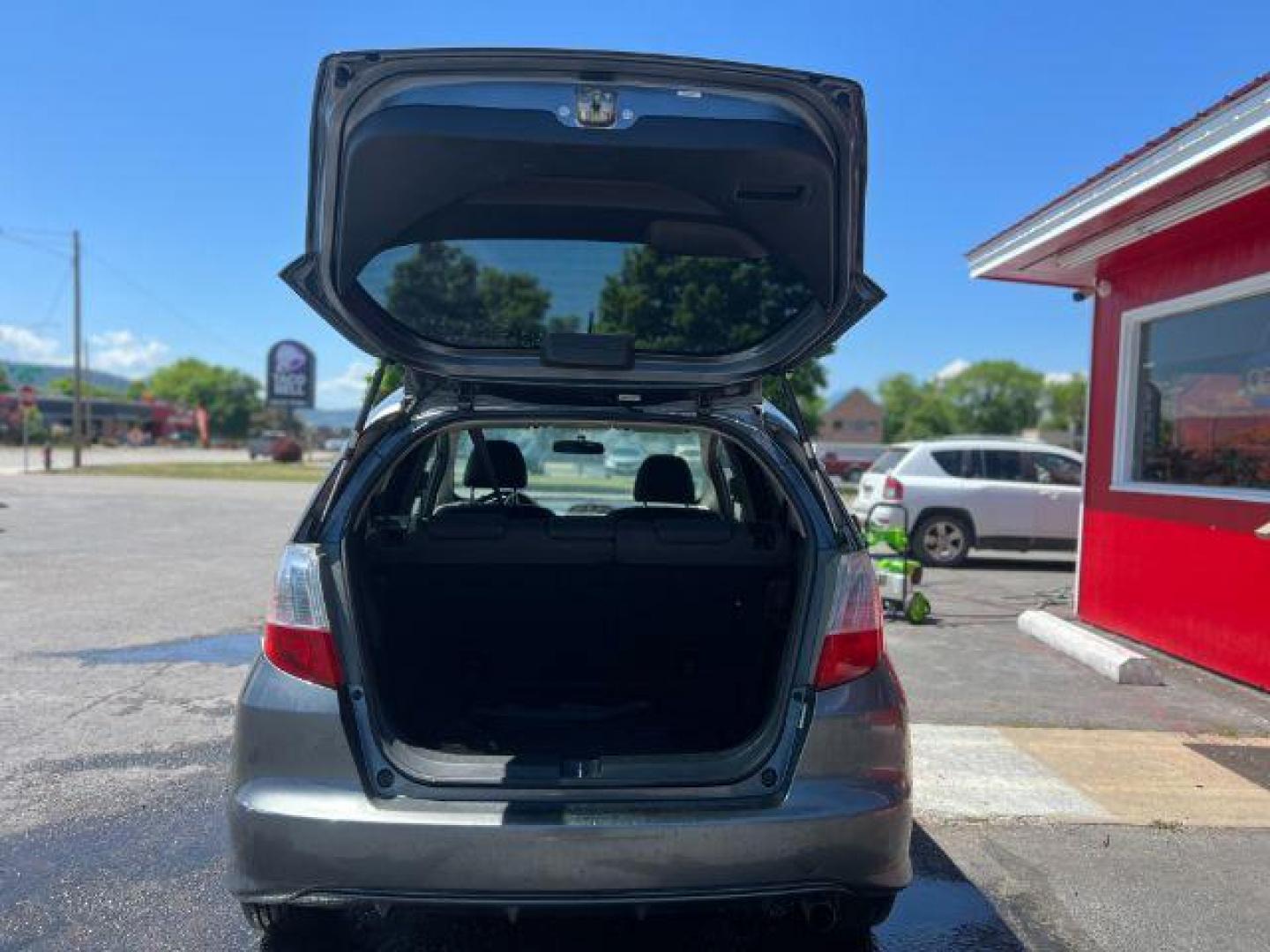 2012 Honda Fit 5-Speed MT (JHMGE8G34CC) with an 1.5L L4 SOHC 16V engine, 5-Speed Manual transmission, located at 601 E. Idaho St., Kalispell, MT, 59901, 48.203983, -114.308662 - Photo#4