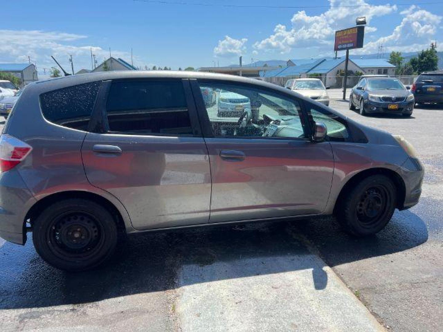 2012 Honda Fit 5-Speed MT (JHMGE8G34CC) with an 1.5L L4 SOHC 16V engine, 5-Speed Manual transmission, located at 601 E. Idaho St., Kalispell, MT, 59901, 48.203983, -114.308662 - Photo#6