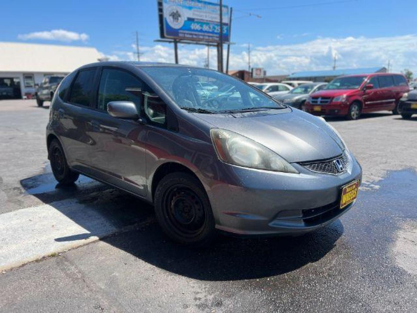 2012 Honda Fit 5-Speed MT (JHMGE8G34CC) with an 1.5L L4 SOHC 16V engine, 5-Speed Manual transmission, located at 601 E. Idaho St., Kalispell, MT, 59901, 48.203983, -114.308662 - Photo#7