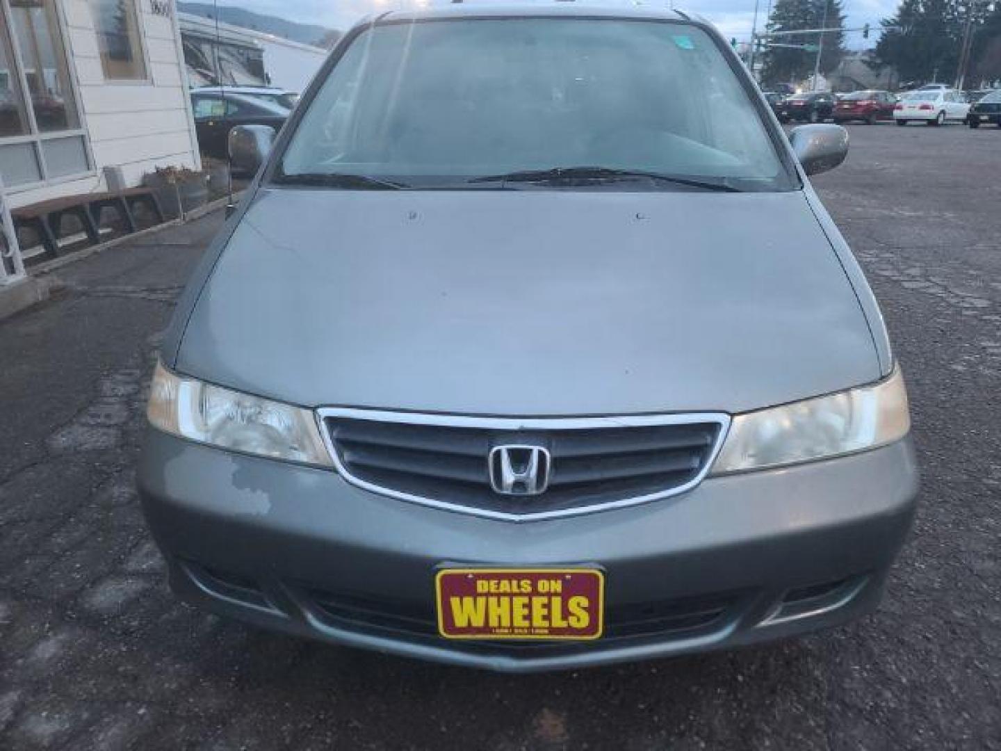 2002 Honda Odyssey EX (2HKRL18642H) with an 3.5L V6 SOHC 24V engine, 5-Speed Automatic transmission, located at 1800 West Broadway, Missoula, 59808, (406) 543-1986, 46.881348, -114.023628 - If you're in the market for a reliable and spacious pre-owned vehicle in Missoula, look no further than this 2002 Honda Odyssey EX available at DOW - Missoula. Priced at $12,995, this van is perfect for families, commuters, or anyone in need of a versatile and comfortable vehicle. The Honda Odyssey - Photo#1