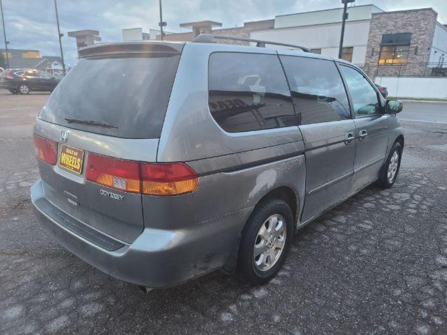 2002 Honda Odyssey EX (2HKRL18642H) with an 3.5L V6 SOHC 24V engine, 5-Speed Automatic transmission, located at 1800 West Broadway, Missoula, 59808, (406) 543-1986, 46.881348, -114.023628 - If you're in the market for a reliable and spacious pre-owned vehicle in Missoula, look no further than this 2002 Honda Odyssey EX available at DOW - Missoula. Priced at $12,995, this van is perfect for families, commuters, or anyone in need of a versatile and comfortable vehicle. The Honda Odyssey - Photo#3