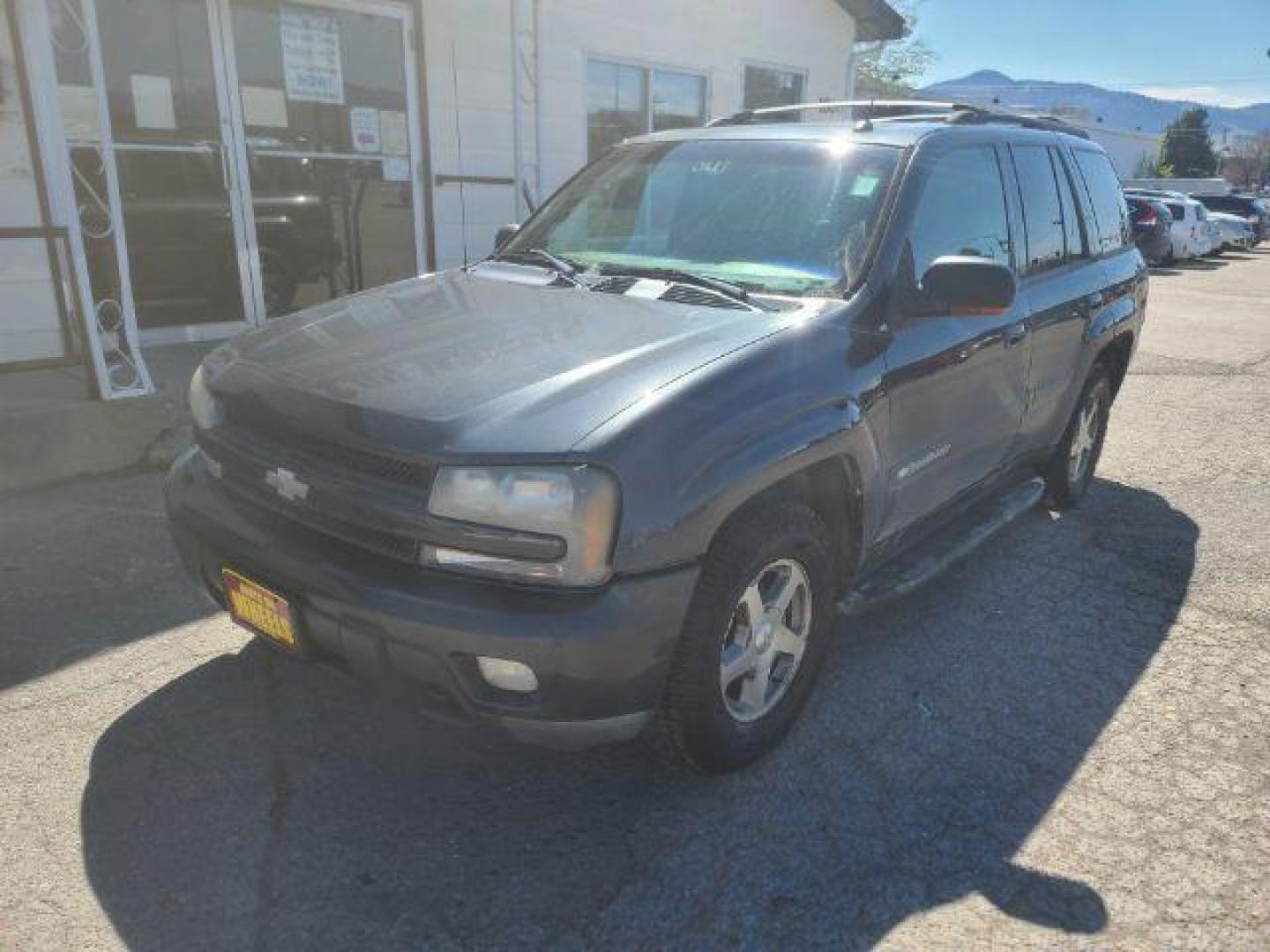 2004 Dark Gray Metallic Chevrolet TrailBlazer LT 4WD (1GNDT13S342) with an 4.2L L6 DOHC 24V engine, 4-Speed Automatic transmission, located at 1800 West Broadway, Missoula, 59808, (406) 543-1986, 46.881348, -114.023628 - Photo#0