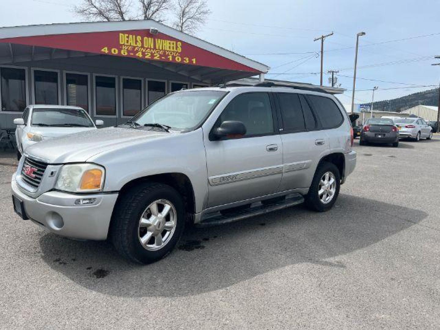 2004 GMC Envoy SLT 4WD (1GKDT13S042) with an 4.2L L6 DOHC 24V engine, 4-Speed Automatic transmission, located at 1821 N Montana Ave., Helena, MT, 59601, 46.603447, -112.022781 - Photo#0