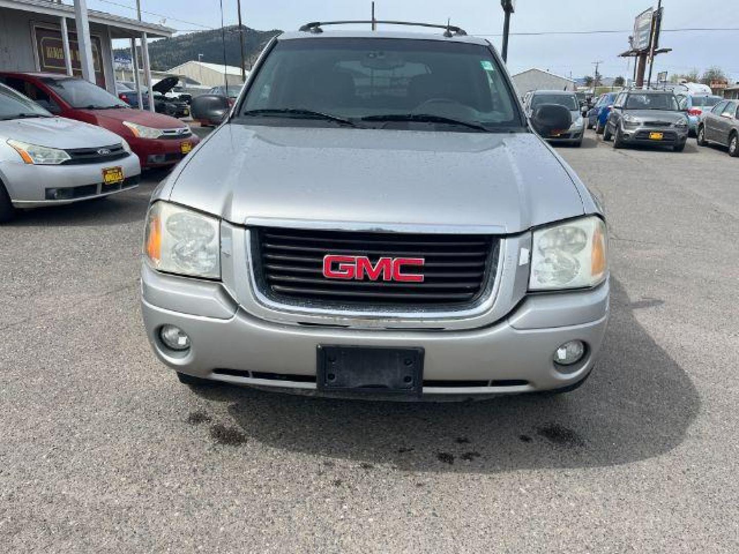 2004 GMC Envoy SLT 4WD (1GKDT13S042) with an 4.2L L6 DOHC 24V engine, 4-Speed Automatic transmission, located at 1821 N Montana Ave., Helena, MT, 59601, 46.603447, -112.022781 - Photo#1