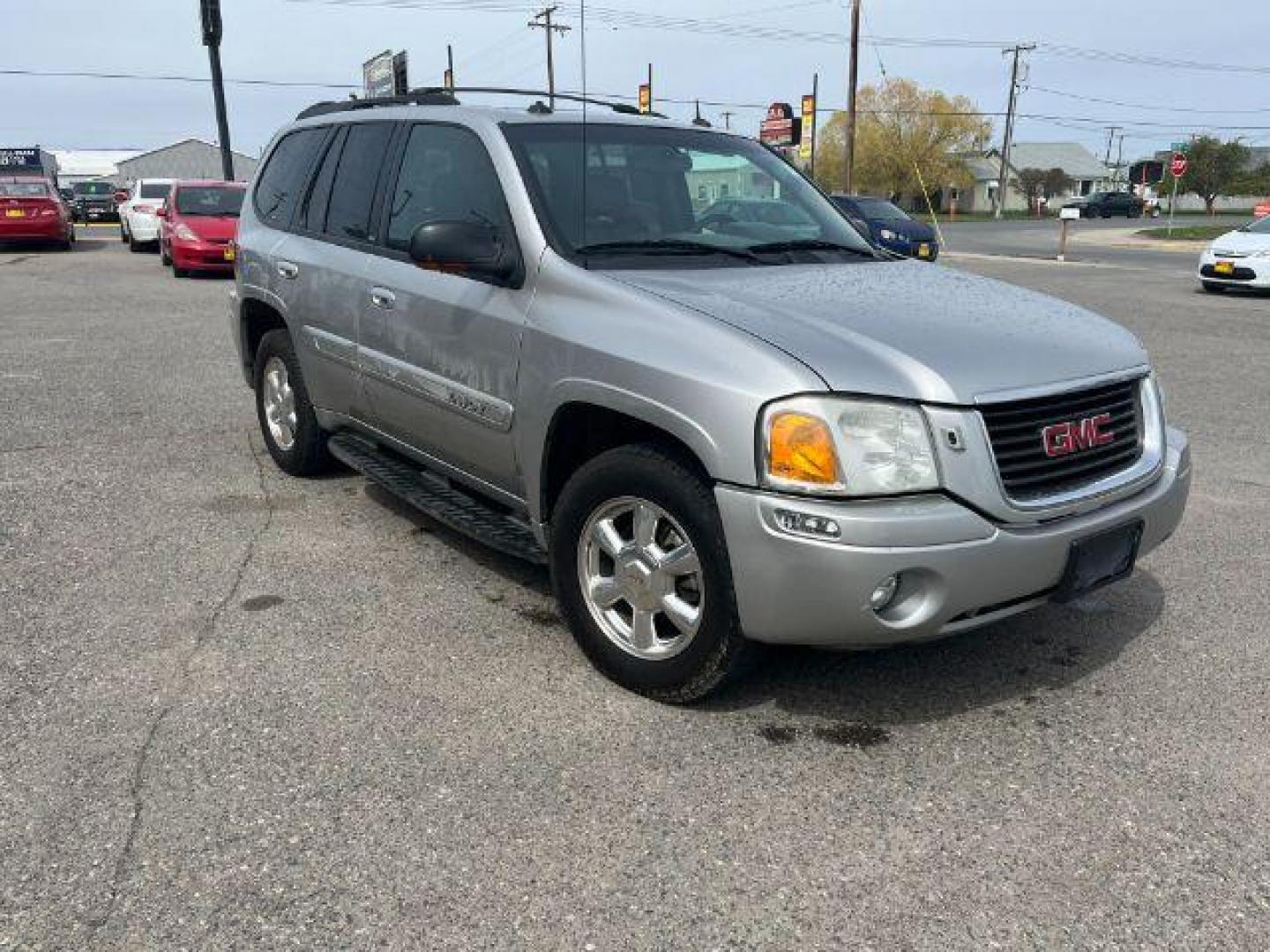 2004 GMC Envoy SLT 4WD (1GKDT13S042) with an 4.2L L6 DOHC 24V engine, 4-Speed Automatic transmission, located at 1821 N Montana Ave., Helena, MT, 59601, 46.603447, -112.022781 - Photo#2