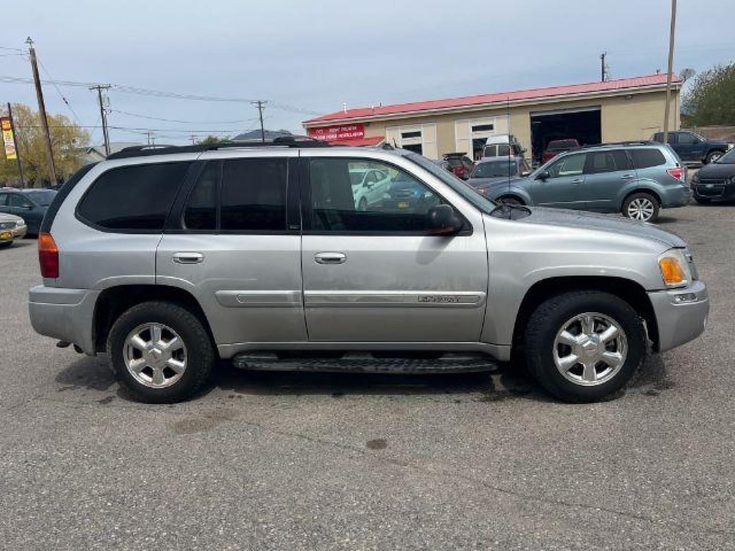 2004 GMC Envoy SLT 4WD (1GKDT13S042) with an 4.2L L6 DOHC 24V engine, 4-Speed Automatic transmission, located at 1821 N Montana Ave., Helena, MT, 59601, 46.603447, -112.022781 - Photo#3