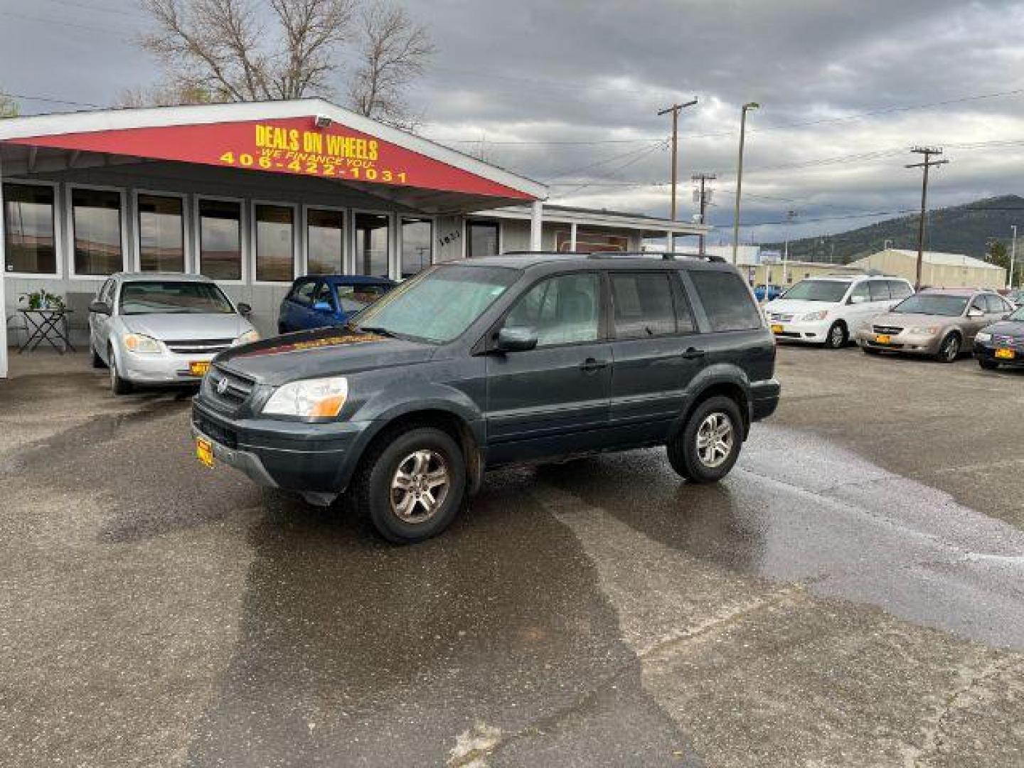 2004 Honda Pilot EX w/ Leather (2HKYF18584H) with an 3.5L V6 SOHC 24V engine, 5-Speed Automatic transmission, located at 1821 N Montana Ave., Helena, MT, 59601, 46.603447, -112.022781 - Photo#0