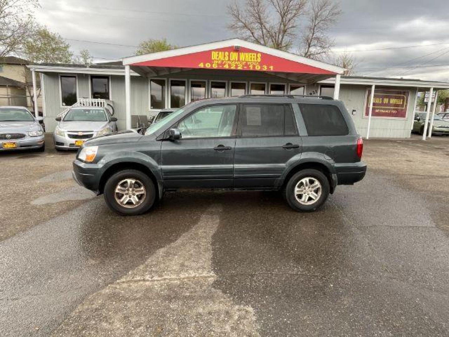 2004 Honda Pilot EX w/ Leather (2HKYF18584H) with an 3.5L V6 SOHC 24V engine, 5-Speed Automatic transmission, located at 1821 N Montana Ave., Helena, MT, 59601, 46.603447, -112.022781 - Photo#5