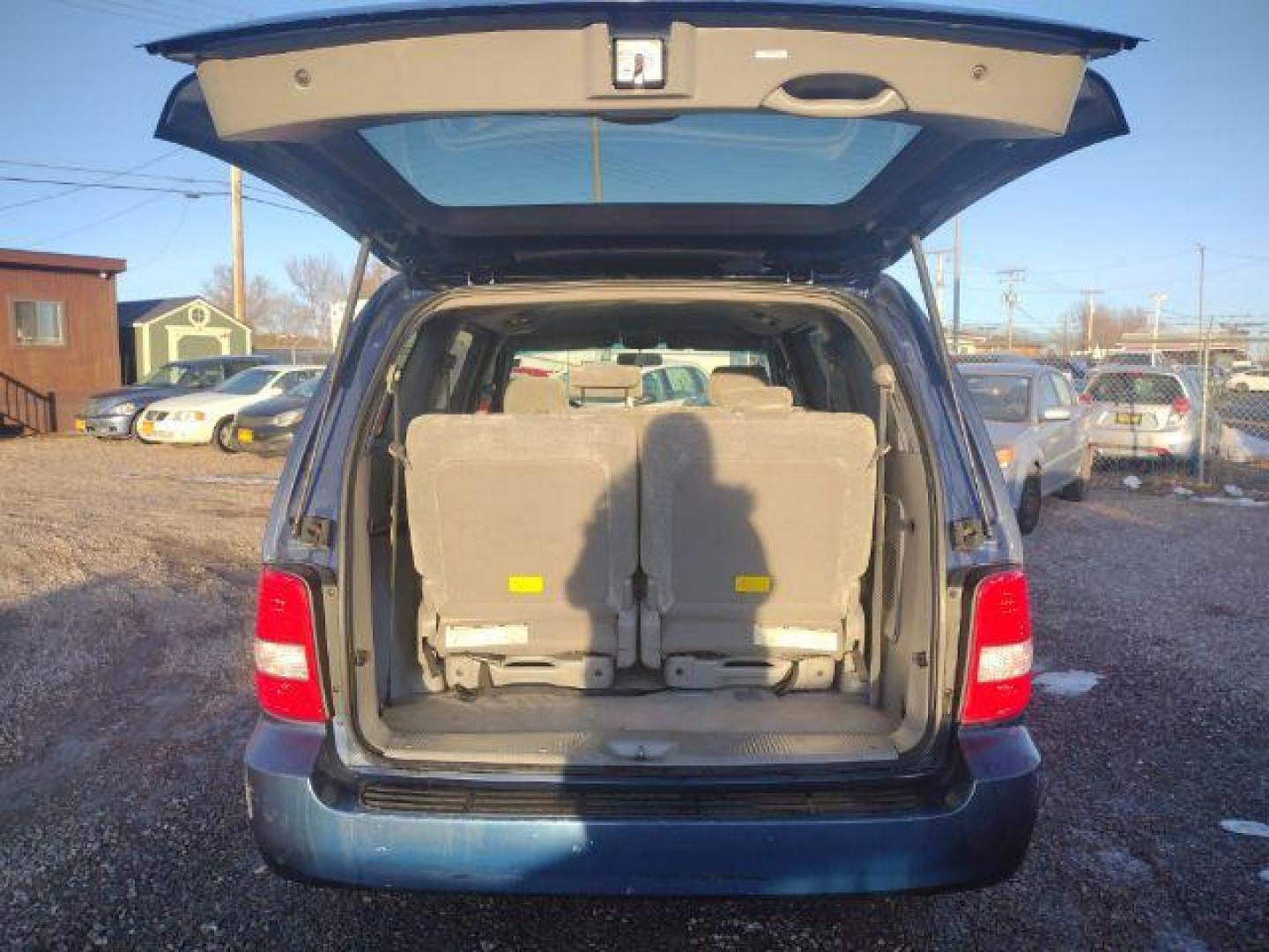 2004 Kia Sedona LX (KNDUP131X46) with an 3.5L V6 DOHC 16V engine, 5-Speed Automatic transmission, located at 4801 10th Ave S,, Great Falls, MT, 59405, 47.494347, -111.229942 - Photo#0