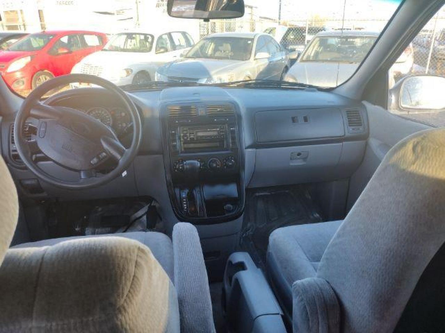 2004 Kia Sedona LX (KNDUP131X46) with an 3.5L V6 DOHC 16V engine, 5-Speed Automatic transmission, located at 4801 10th Ave S,, Great Falls, MT, 59405, 47.494347, -111.229942 - Photo#9