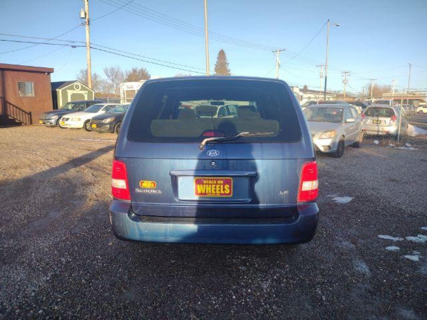 2004 Kia Sedona LX (KNDUP131X46) with an 3.5L V6 DOHC 16V engine, 5-Speed Automatic transmission, located at 4801 10th Ave S,, Great Falls, MT, 59405, 47.494347, -111.229942 - Photo#3