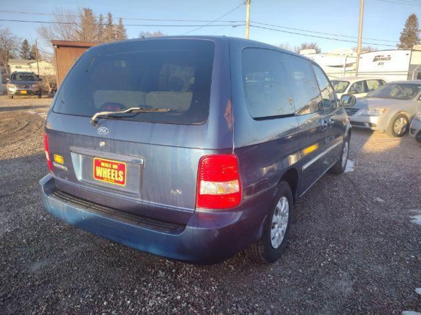 2004 Kia Sedona LX (KNDUP131X46) with an 3.5L V6 DOHC 16V engine, 5-Speed Automatic transmission, located at 4801 10th Ave S,, Great Falls, MT, 59405, 47.494347, -111.229942 - Photo#4