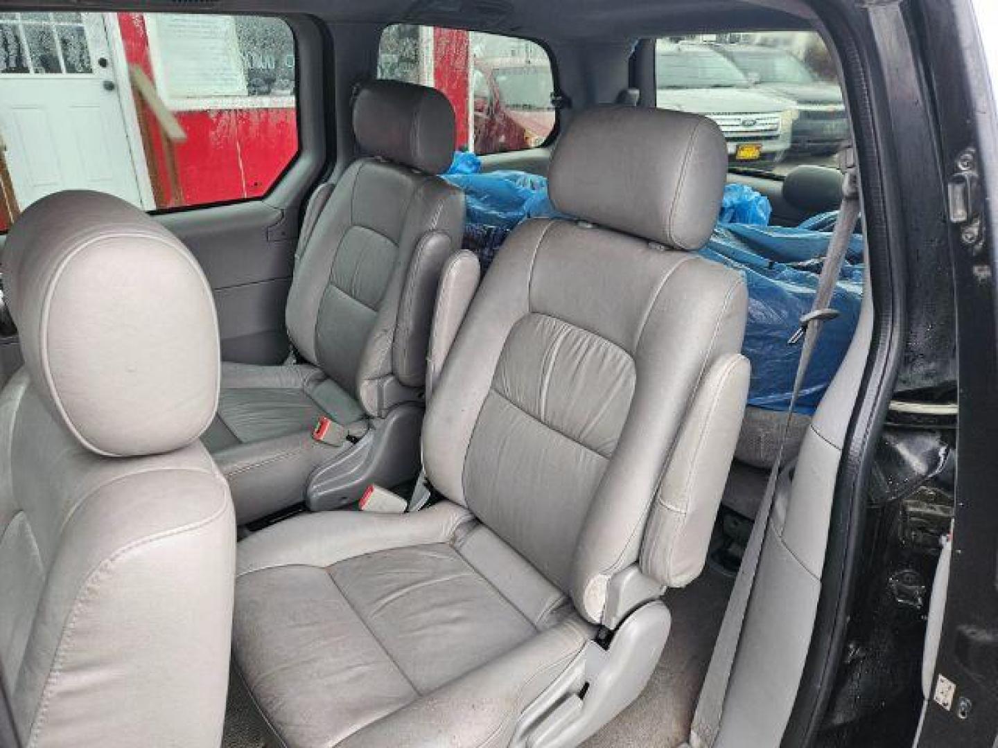 2004 Kia Sedona LX (KNDUP131046) with an 3.5L V6 DOHC 16V engine, 5-Speed Automatic transmission, located at 601 E. Idaho St., Kalispell, MT, 59901, 48.203983, -114.308662 - Photo#9