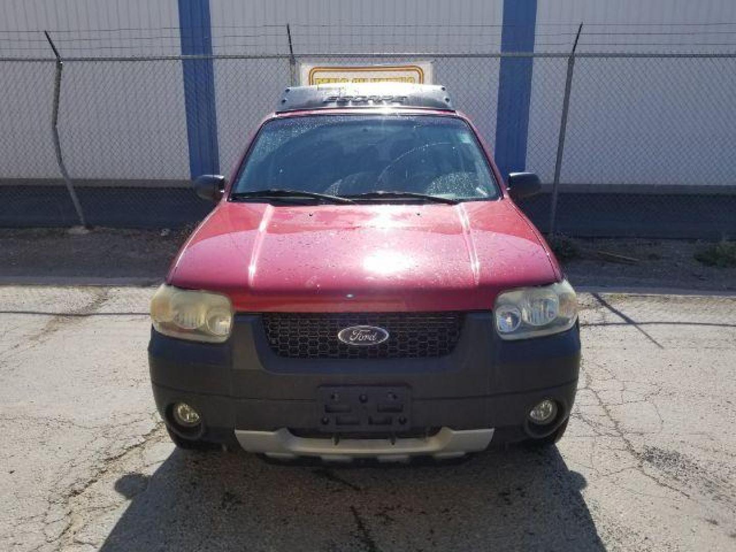 2005 Red Fire Metallic Ford Escape XLT 4WD (1FMYU93125K) with an 3.0L V6 DOHC 24V engine, 4-Speed Automatic transmission, located at 4801 10th Ave S,, Great Falls, MT, 59405, 47.494347, -111.229942 - Photo#1