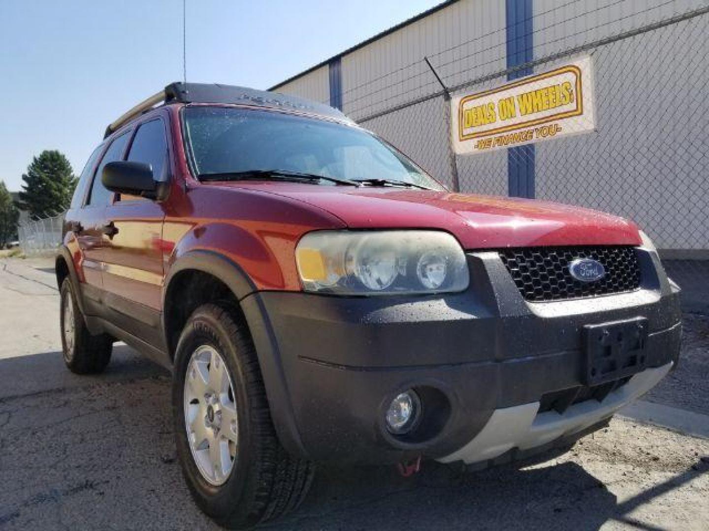 2005 Red Fire Metallic Ford Escape XLT 4WD (1FMYU93125K) with an 3.0L V6 DOHC 24V engine, 4-Speed Automatic transmission, located at 4801 10th Ave S,, Great Falls, MT, 59405, 47.494347, -111.229942 - Photo#6