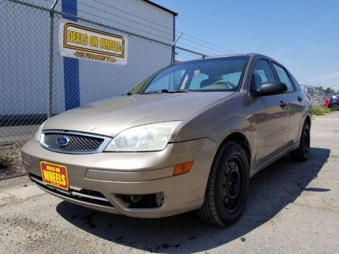 2005 Arizona Beige Metall Ford Focus ZX4 SE (1FAFP34N75W) with an 2.0L L4 DOHC 16V engine, located at 601 E. Idaho St., Kalispell, MT, 59901, 48.203983, -114.308662 - Photo#0