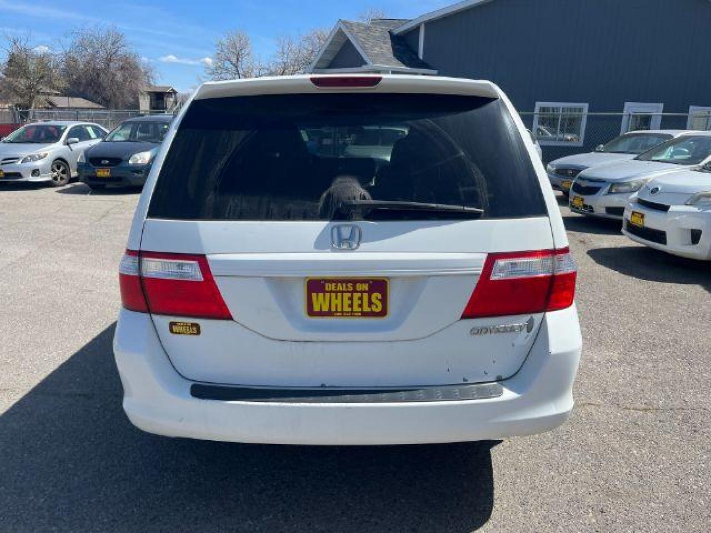 2005 Honda Odyssey EX w/ Leather DVD (5FNRL38745B) with an 3.5L V6 SOHC 24V engine, 5-Speed Automatic transmission, located at 1821 N Montana Ave., Helena, MT, 59601, 46.603447, -112.022781 - Photo#3