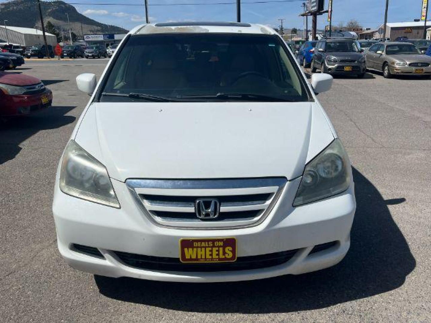 2005 Honda Odyssey EX w/ Leather DVD (5FNRL38745B) with an 3.5L V6 SOHC 24V engine, 5-Speed Automatic transmission, located at 1821 N Montana Ave., Helena, MT, 59601, 46.603447, -112.022781 - Photo#1