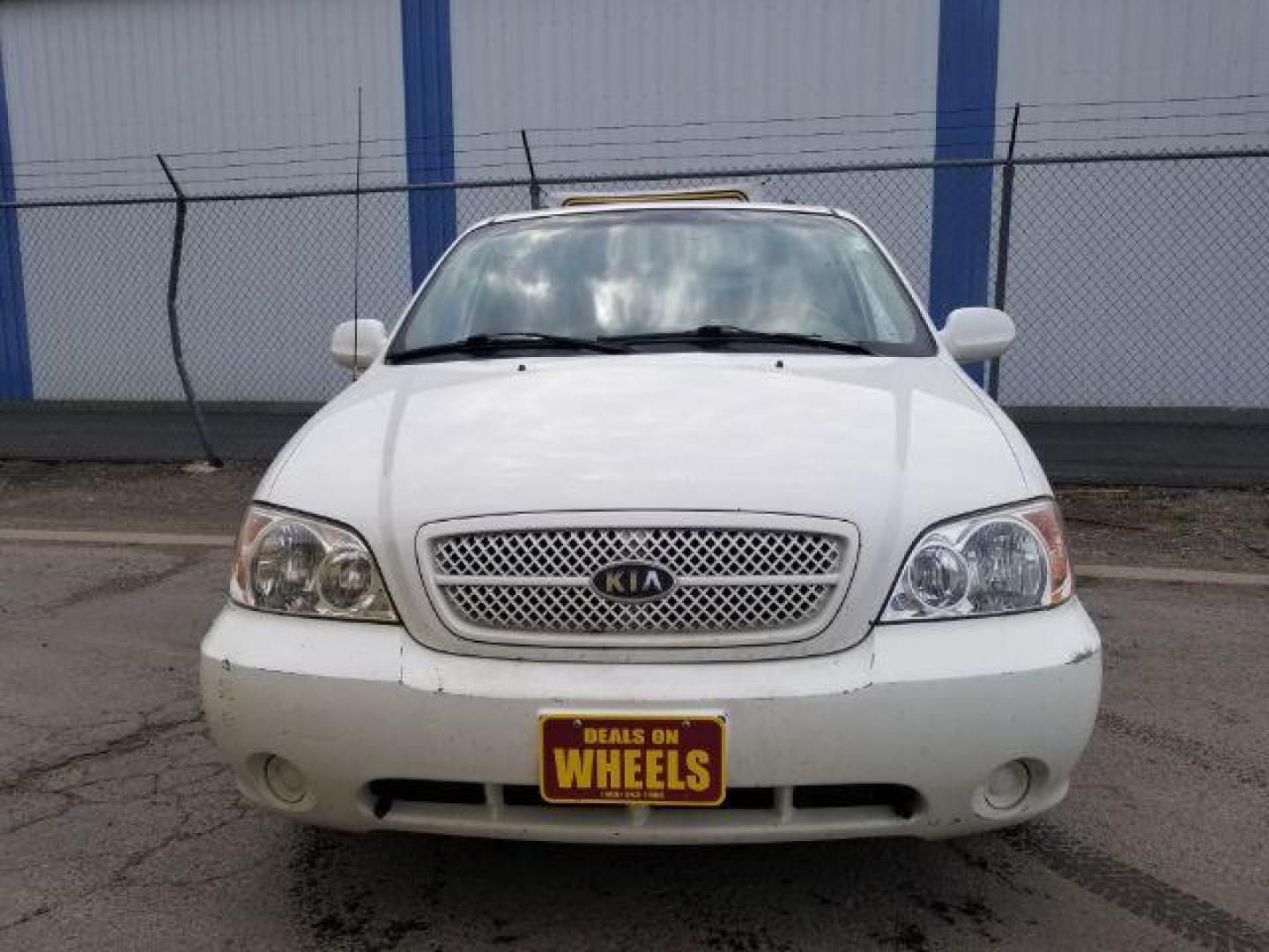 2005 Clear White /Beige Cloth Interior Kia Sedona LX (KNDUP132856) with an 3.5L V6 DOHC 16V engine, 5-Speed Automatic transmission, located at 4801 10th Ave S,, Great Falls, MT, 59405, 47.494347, -111.229942 - Photo#1