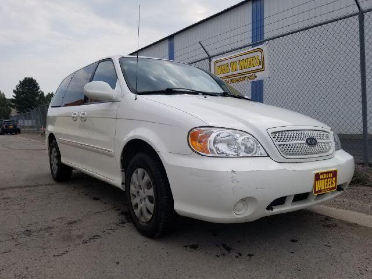 2005 Clear White /Beige Cloth Interior Kia Sedona LX (KNDUP132856) with an 3.5L V6 DOHC 16V engine, 5-Speed Automatic transmission, located at 4801 10th Ave S,, Great Falls, MT, 59405, 47.494347, -111.229942 - Photo#6