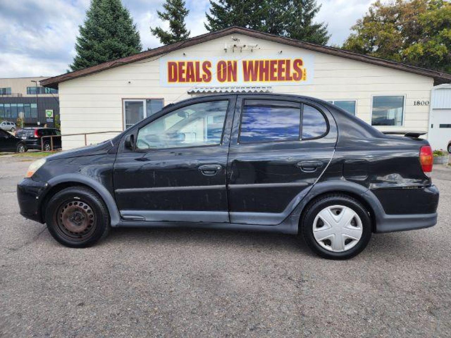 2005 Black Sand Pearl Toyota Echo 4-Door Sedan (JTDBT123050) with an 1.5L L4 DOHC 16V engine, located at 1800 West Broadway, Missoula, 59808, (406) 543-1986, 46.881348, -114.023628 - Photo#6