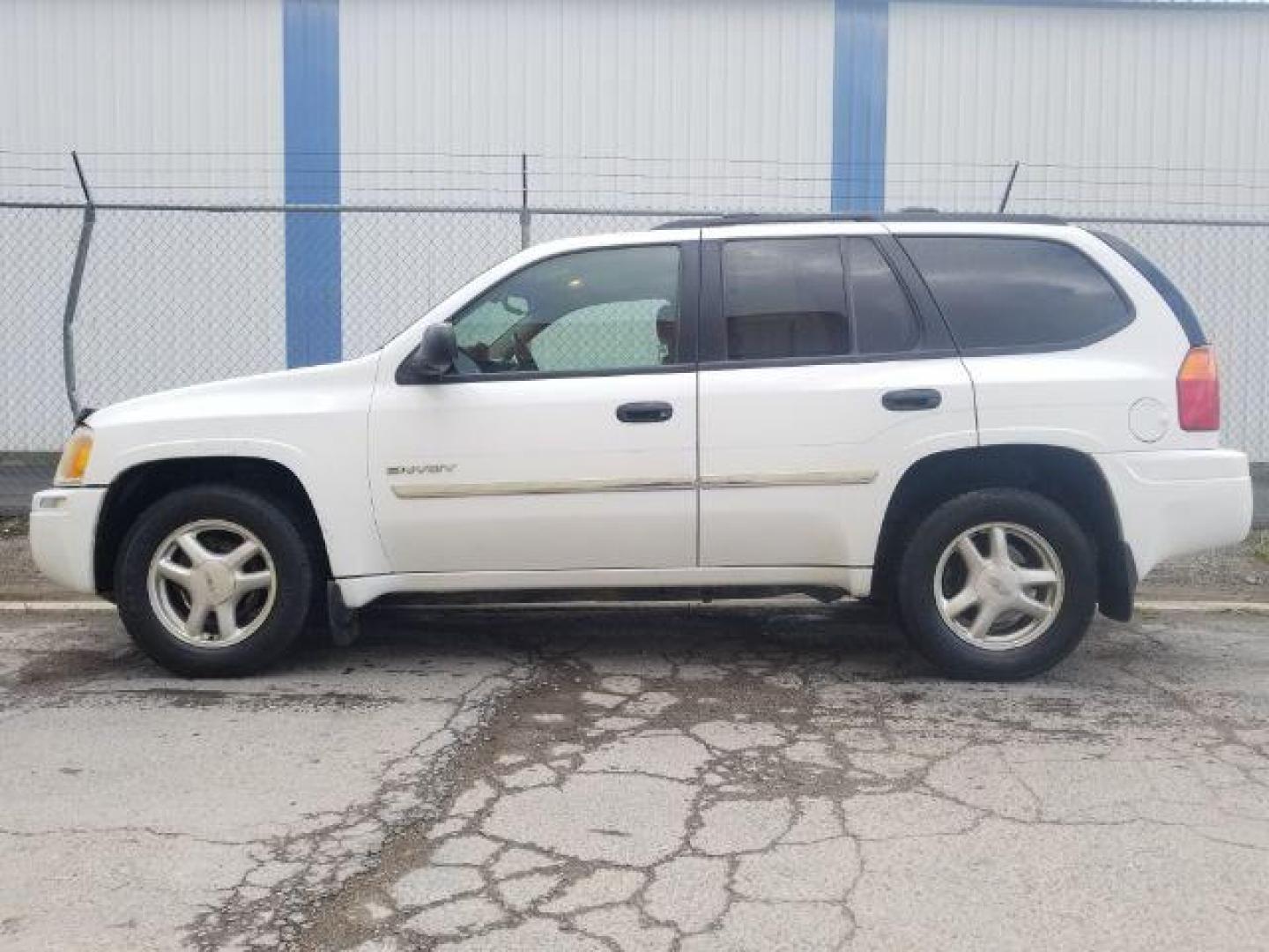 2006 GMC Envoy SLE 4WD (1GKDT13SX62) with an 4.2L L6 DOHC 24V engine, 4-Speed Automatic transmission, located at 4801 10th Ave S,, Great Falls, MT, 59405, 47.494347, -111.229942 - Photo#2