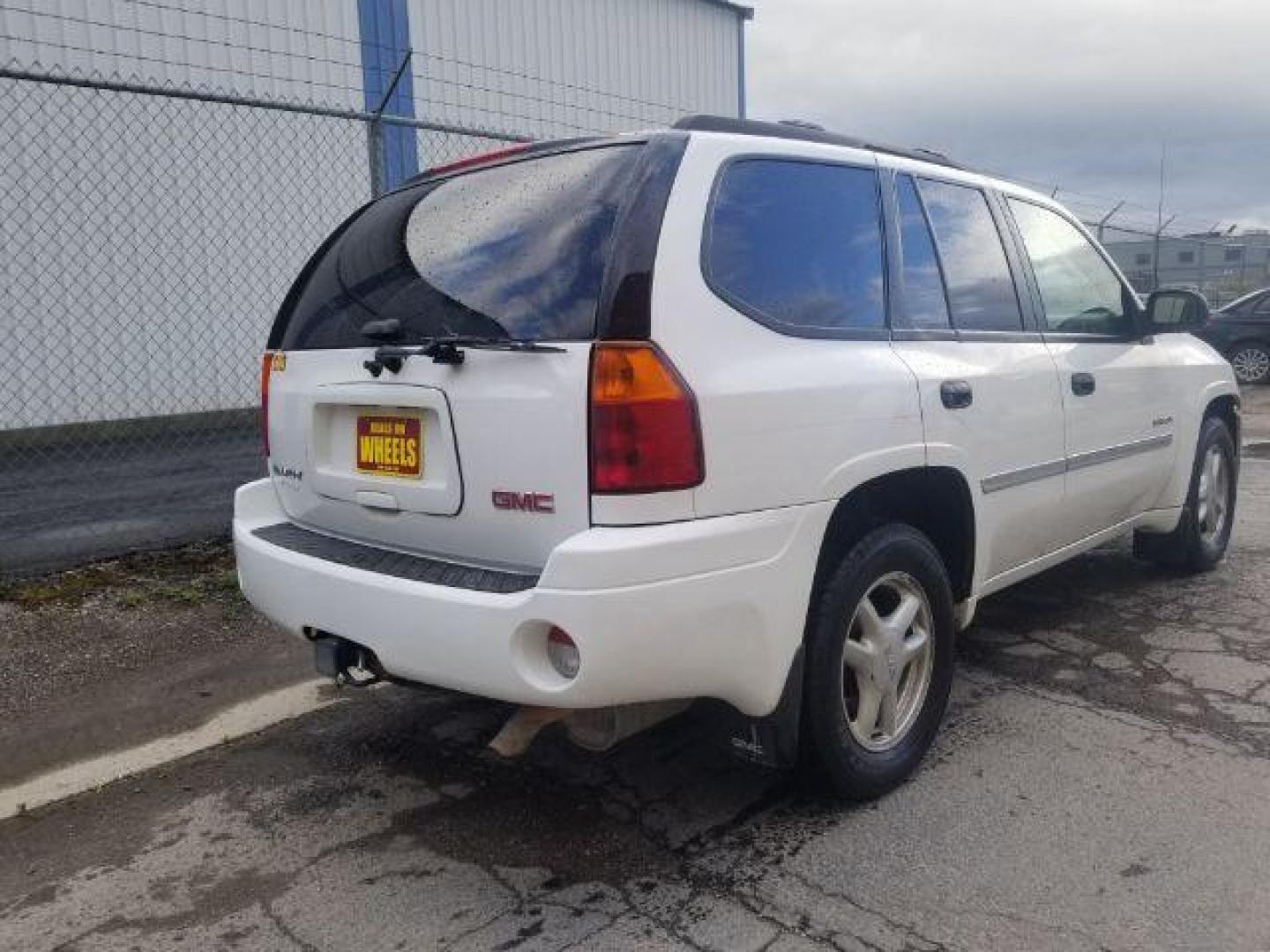 2006 GMC Envoy SLE 4WD (1GKDT13SX62) with an 4.2L L6 DOHC 24V engine, 4-Speed Automatic transmission, located at 4801 10th Ave S,, Great Falls, MT, 59405, 47.494347, -111.229942 - Photo#4