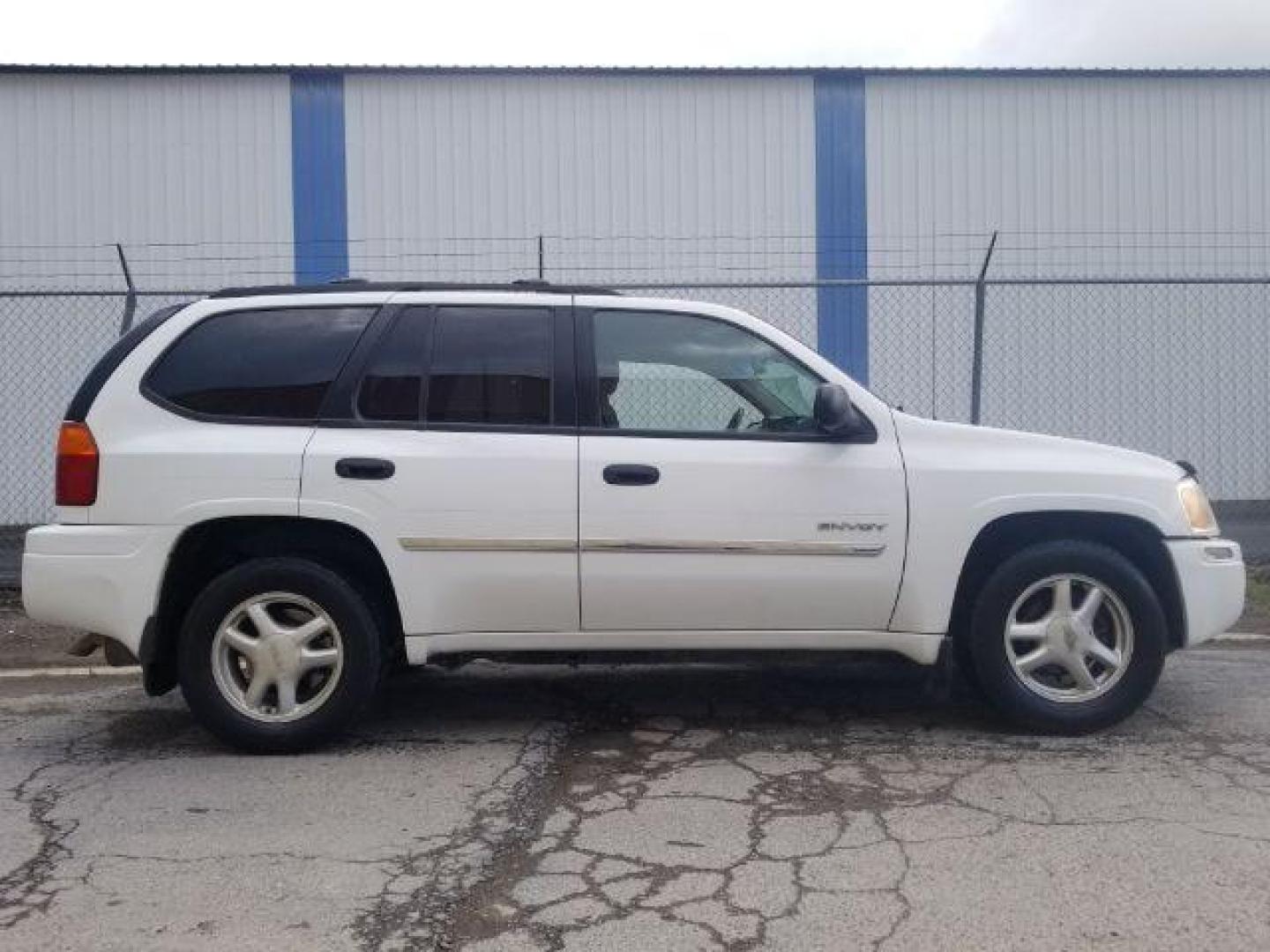 2006 GMC Envoy SLE 4WD (1GKDT13SX62) with an 4.2L L6 DOHC 24V engine, 4-Speed Automatic transmission, located at 4801 10th Ave S,, Great Falls, MT, 59405, 47.494347, -111.229942 - Photo#5