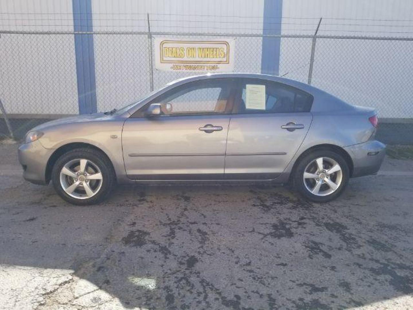 2006 Mazda MAZDA3 i 4-door (JM1BK12FX61) with an 2.0L L4 DOHC 16V engine, located at 601 E. Idaho St., Kalispell, MT, 59901, 48.203983, -114.308662 - Photo#2