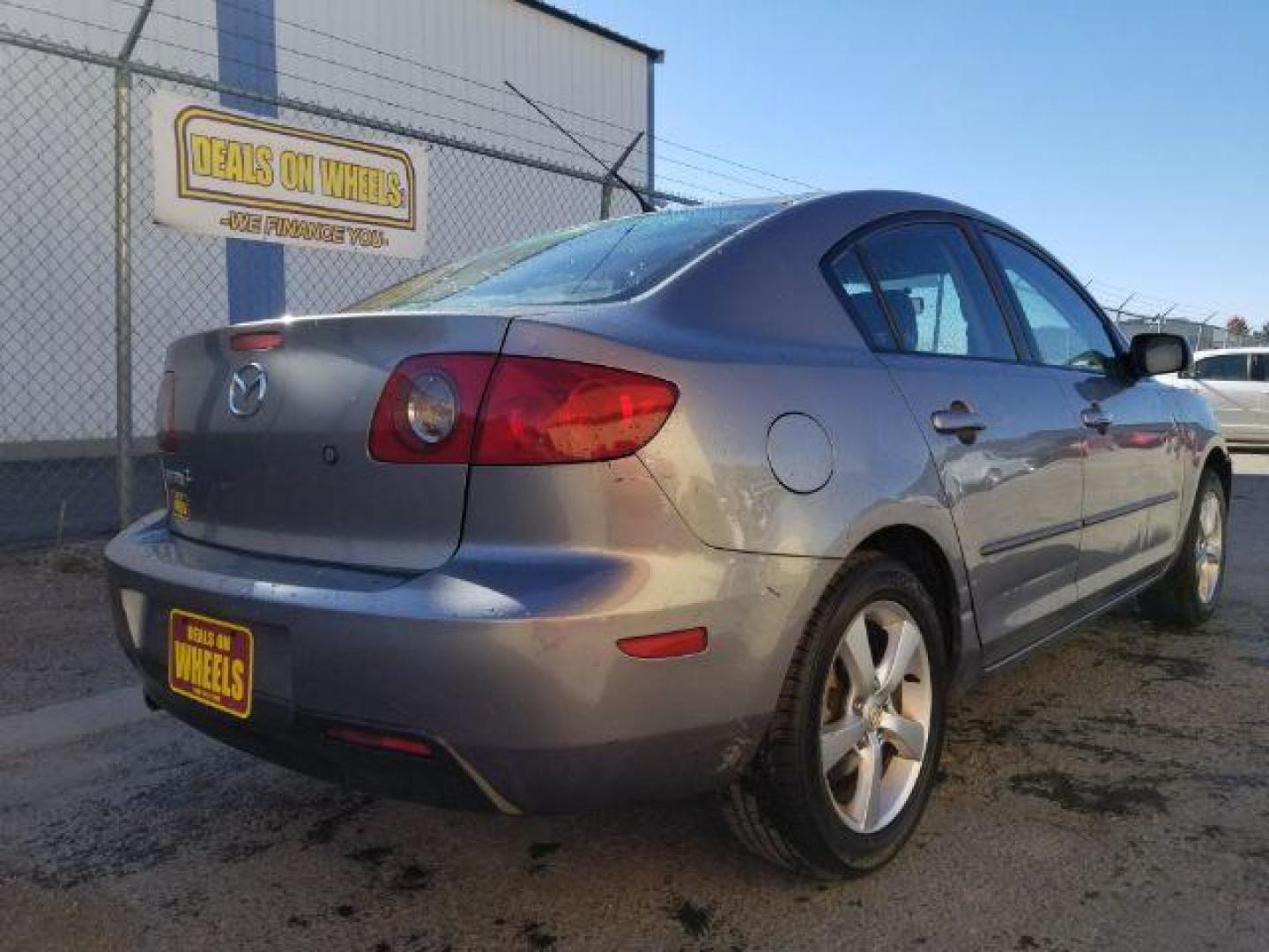 2006 Mazda MAZDA3 i 4-door (JM1BK12FX61) with an 2.0L L4 DOHC 16V engine, located at 601 E. Idaho St., Kalispell, MT, 59901, 48.203983, -114.308662 - Photo#4