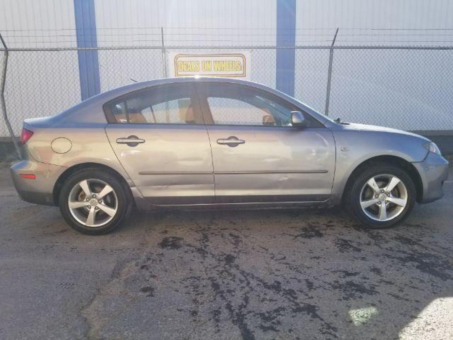 2006 Mazda MAZDA3 i 4-door (JM1BK12FX61) with an 2.0L L4 DOHC 16V engine, located at 601 E. Idaho St., Kalispell, MT, 59901, 48.203983, -114.308662 - Photo#5