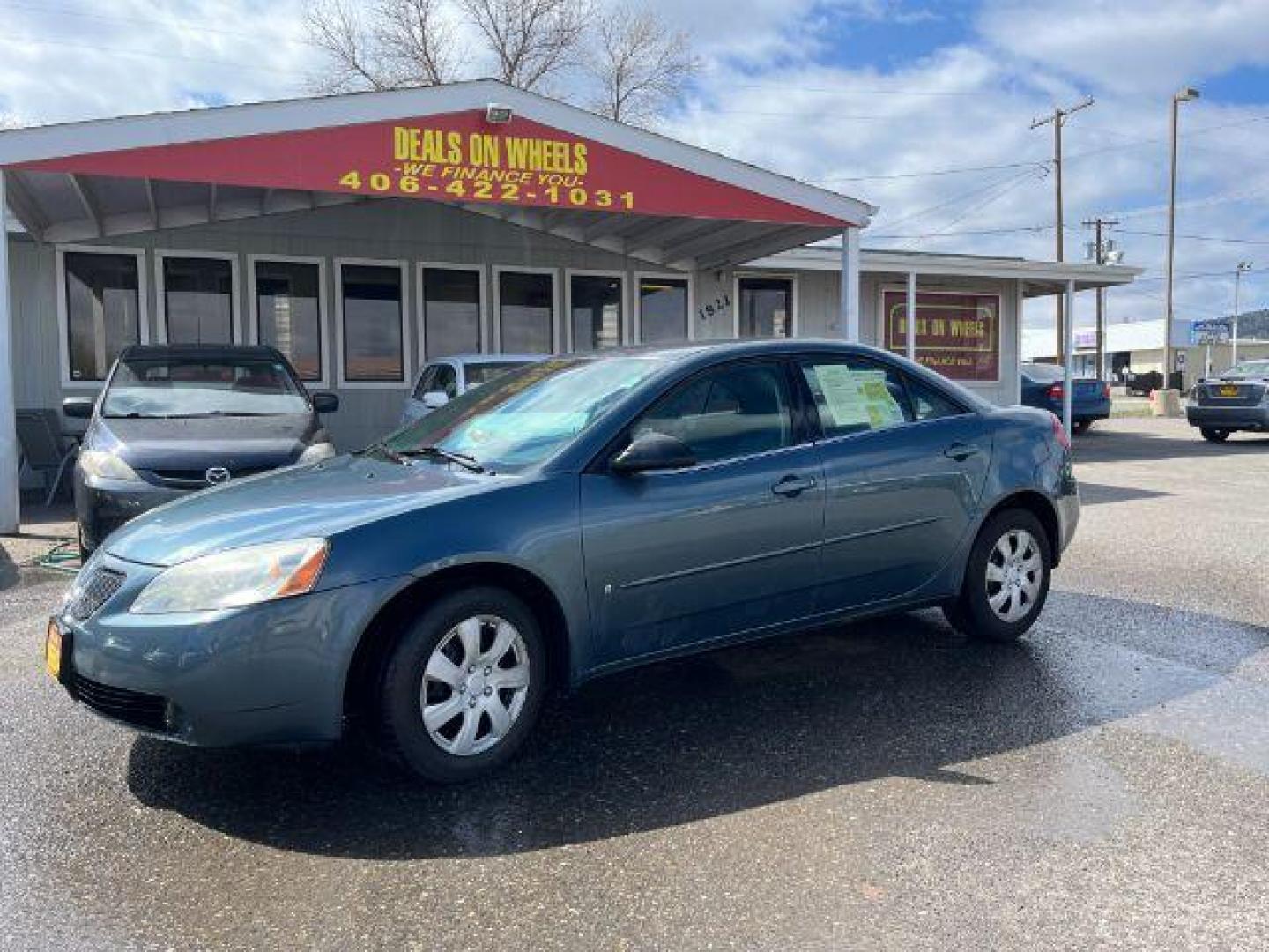 2006 Pontiac G6 V6 Sedan (1G2ZG558564) with an 3.5L V6 OHV 12V engine, 4-Speed Automatic transmission, located at 1821 N Montana Ave., Helena, MT, 59601, 46.603447, -112.022781 - Photo#0