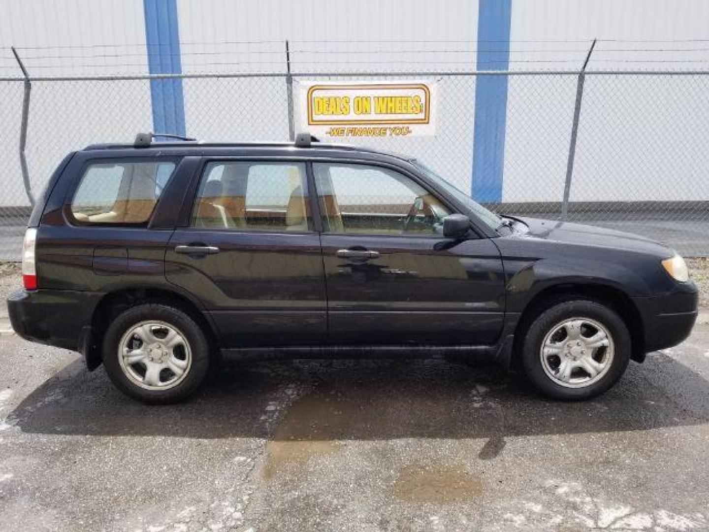 2006 Subaru Forester 2.5X (JF1SG63636H) with an 2.5L H4 SOHC 16V engine, 4-Speed Automatic transmission, located at 4801 10th Ave S,, Great Falls, MT, 59405, 47.494347, -111.229942 - Photo#5