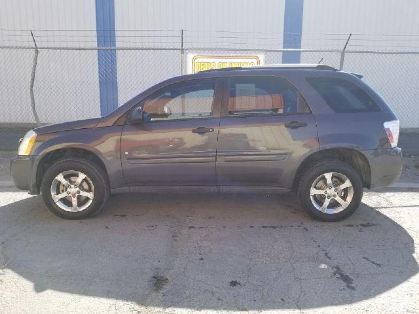 2007 Granite Gray Metalli Chevrolet Equinox LS 2WD (2CNDL13F976) with an 3.4L V6 OHV 12V engine, 5-Speed Automatic transmission, located at 4801 10th Ave S,, Great Falls, MT, 59405, 47.494347, -111.229942 - Photo#2