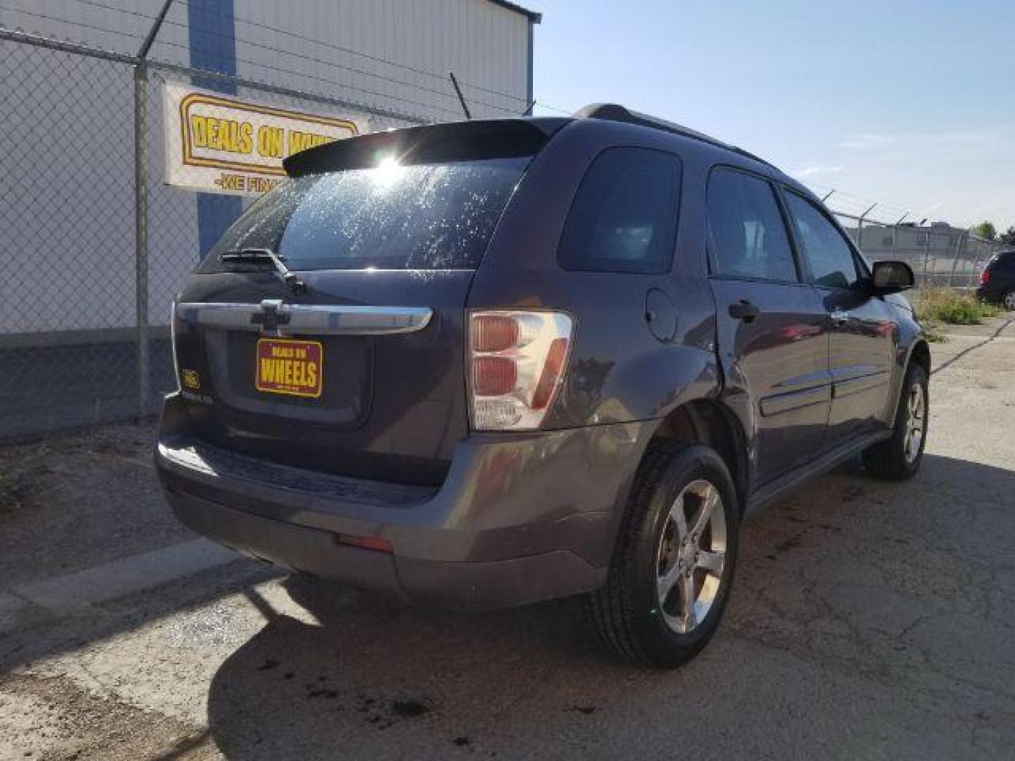 2007 Granite Gray Metalli Chevrolet Equinox LS 2WD (2CNDL13F976) with an 3.4L V6 OHV 12V engine, 5-Speed Automatic transmission, located at 4801 10th Ave S,, Great Falls, MT, 59405, 47.494347, -111.229942 - Photo#4