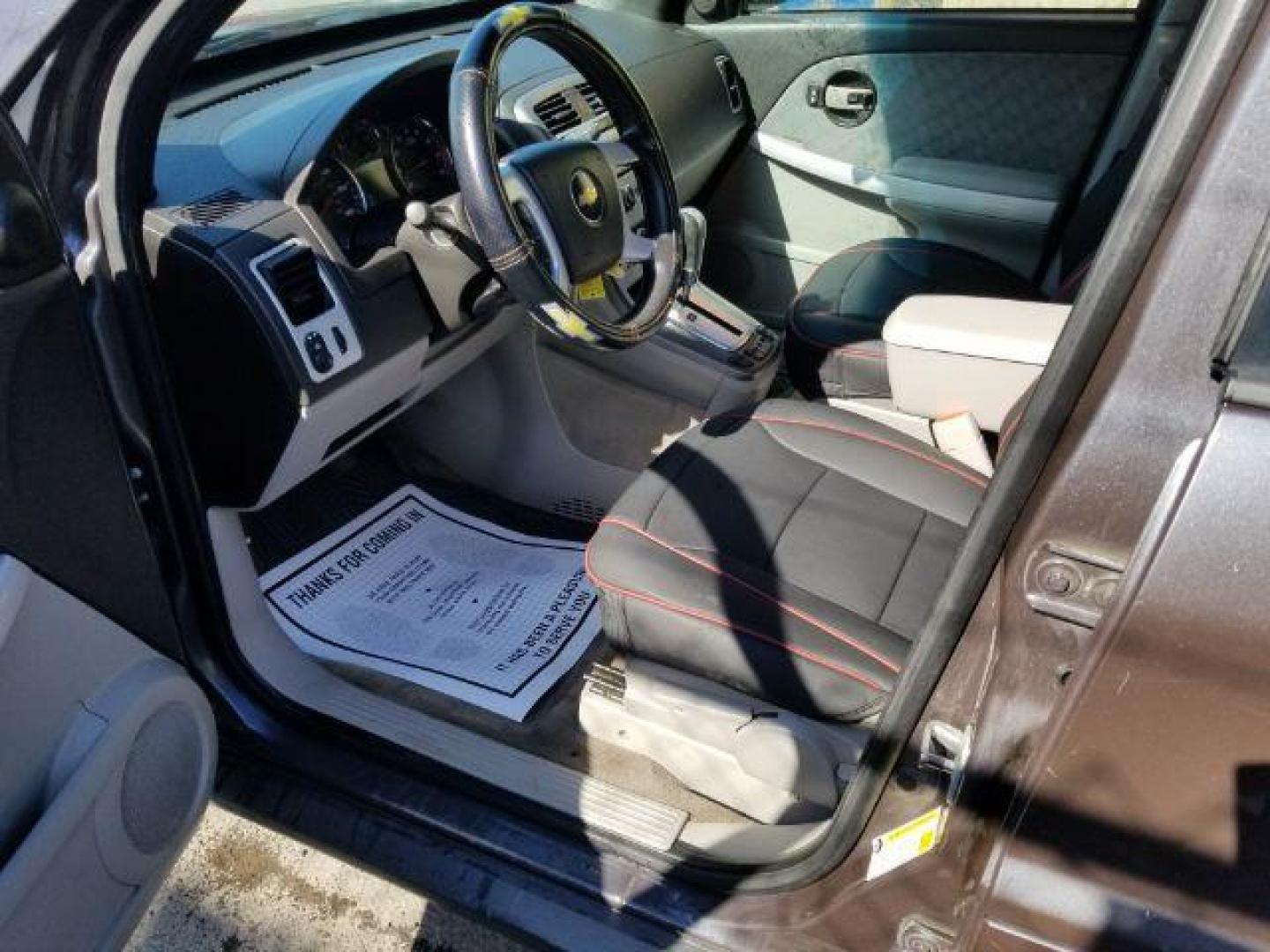 2007 Granite Gray Metalli Chevrolet Equinox LS 2WD (2CNDL13F976) with an 3.4L V6 OHV 12V engine, 5-Speed Automatic transmission, located at 4801 10th Ave S,, Great Falls, MT, 59405, 47.494347, -111.229942 - Photo#7