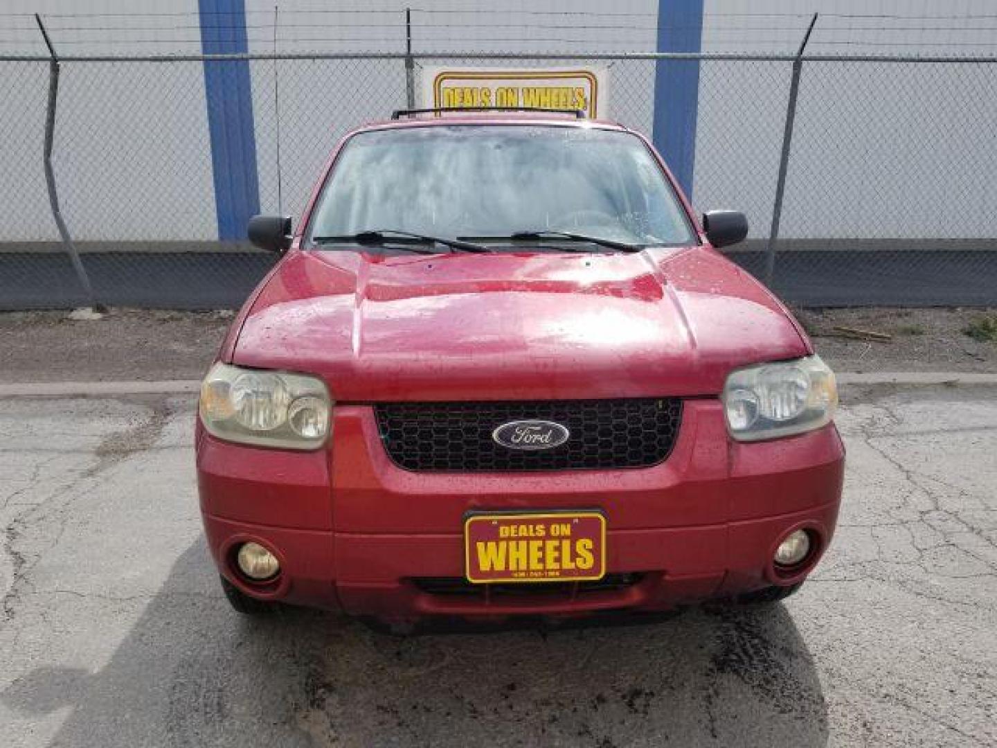 2007 Red Fire Metallic Ford Escape Limited 4WD (1FMYU94127K) with an 3.0L V6 DOHC 24V engine, 4-Speed Automatic transmission, located at 4801 10th Ave S,, Great Falls, MT, 59405, 47.494347, -111.229942 - Photo#1