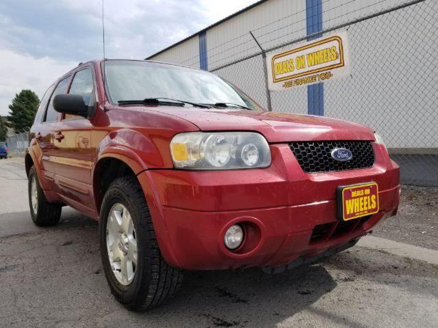 2007 Red Fire Metallic Ford Escape Limited 4WD (1FMYU94127K) with an 3.0L V6 DOHC 24V engine, 4-Speed Automatic transmission, located at 4801 10th Ave S,, Great Falls, MT, 59405, 47.494347, -111.229942 - Photo#6