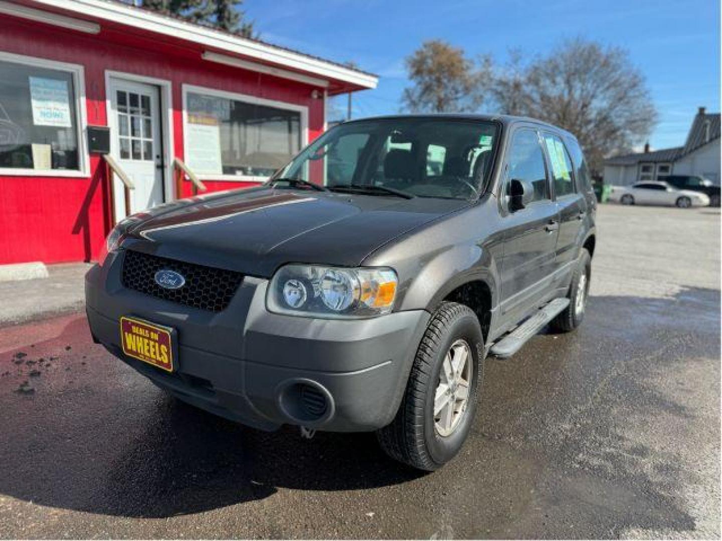 2007 Tungsten Grey Metallic Ford Escape XLS 4WD (1FMCU92Z87K) with an 2.3L L4 DOHC 16V engine, 4-Speed Automatic transmission, located at 601 E. Idaho St., Kalispell, MT, 59901, 48.203983, -114.308662 - Photo#0