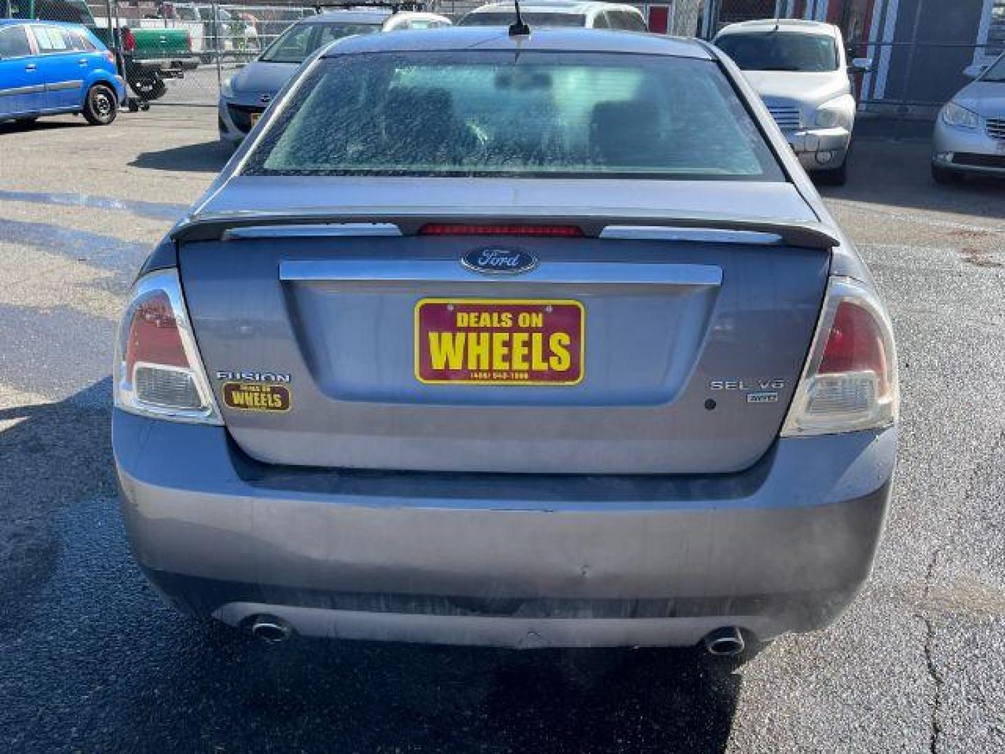 2007 Ford Fusion V6 SEL AWD (3FAHP021X7R) with an 3.0L V6 DOHC 24V engine, located at 1821 N Montana Ave., Helena, MT, 59601, 46.603447, -112.022781 - Photo#4