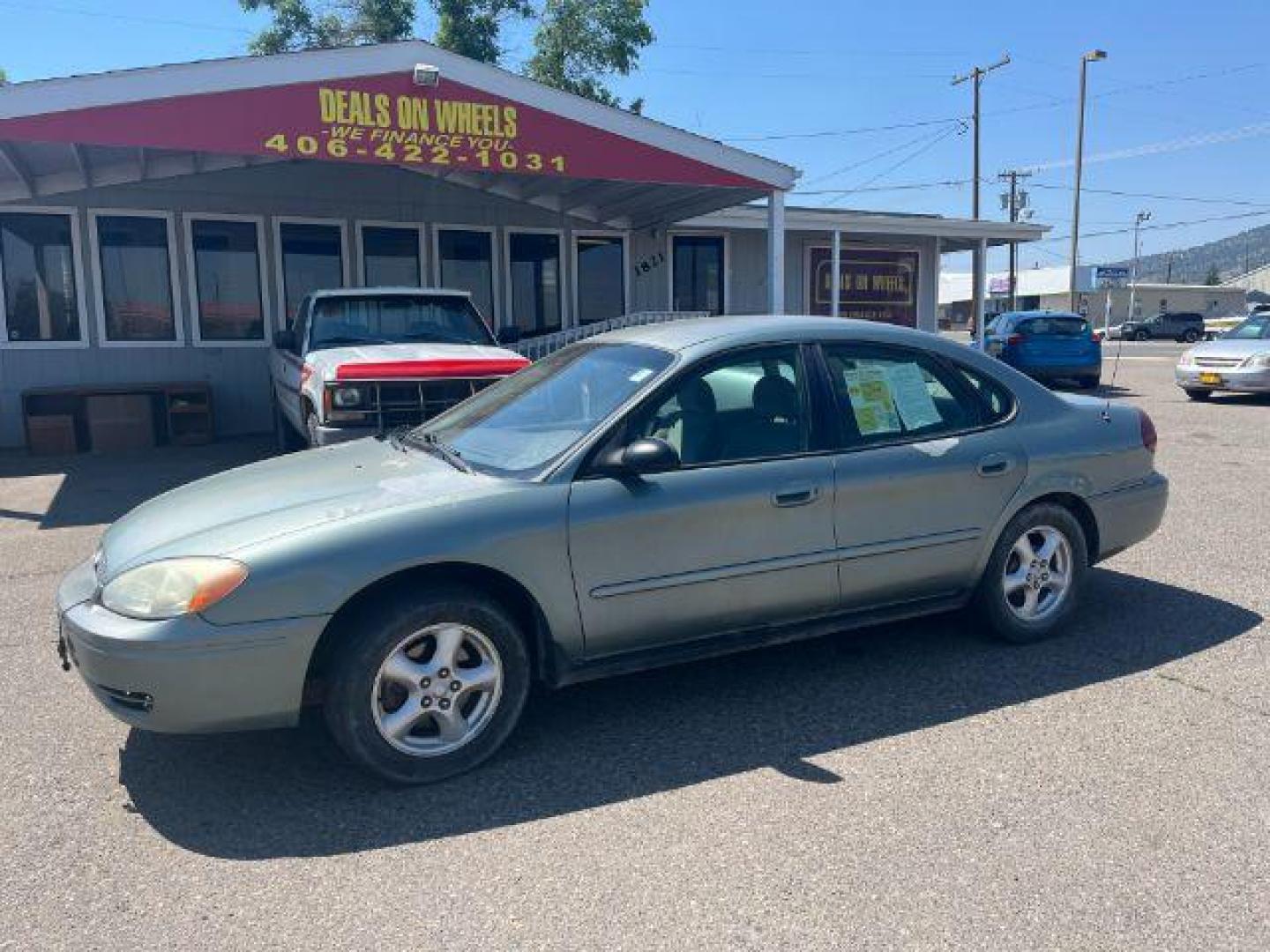 2007 Green Ford Taurus n/a (1FAFP53UX7A) with an 3.0 L engine, located at 1821 N Montana Ave., Helena, MT, 59601, 46.603447, -112.022781 - Photo#0