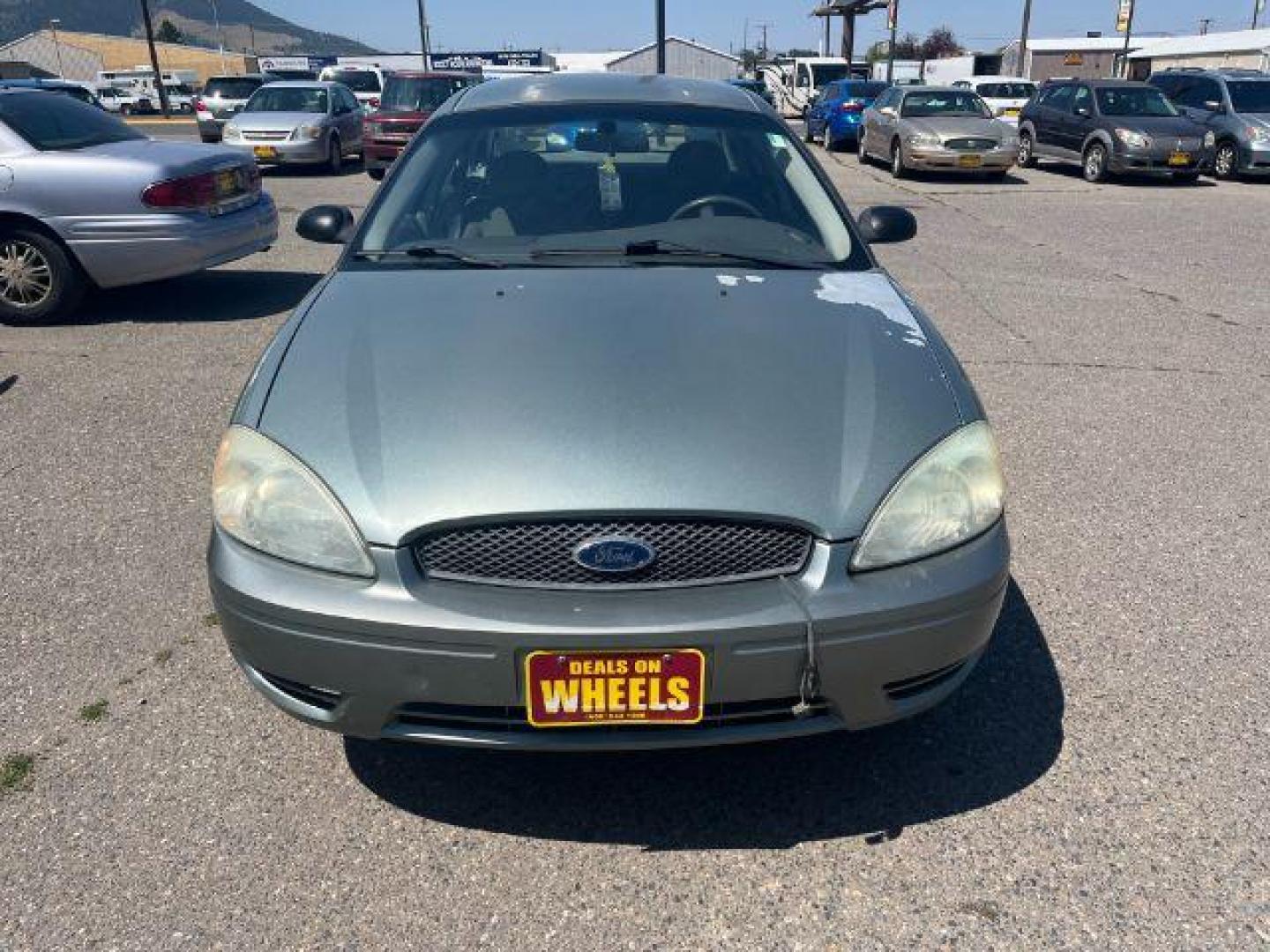 2007 Green Ford Taurus n/a (1FAFP53UX7A) with an 3.0 L engine, located at 1821 N Montana Ave., Helena, MT, 59601, 46.603447, -112.022781 - Photo#1