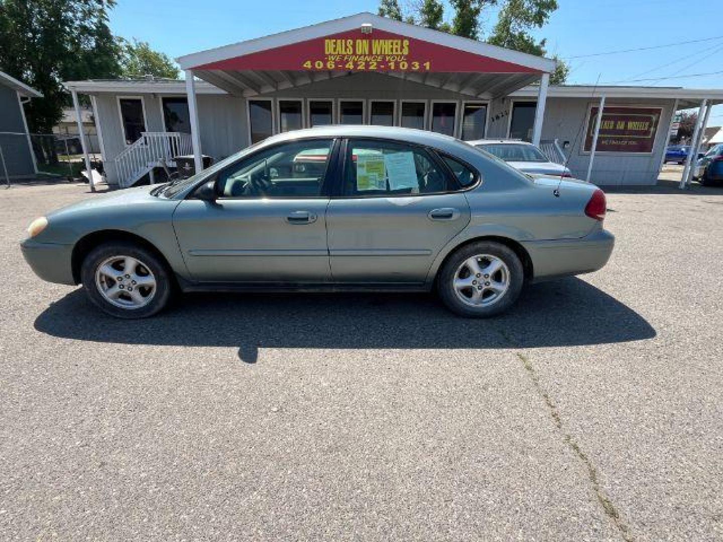 2007 Green Ford Taurus n/a (1FAFP53UX7A) with an 3.0 L engine, located at 1821 N Montana Ave., Helena, MT, 59601, 46.603447, -112.022781 - Photo#7