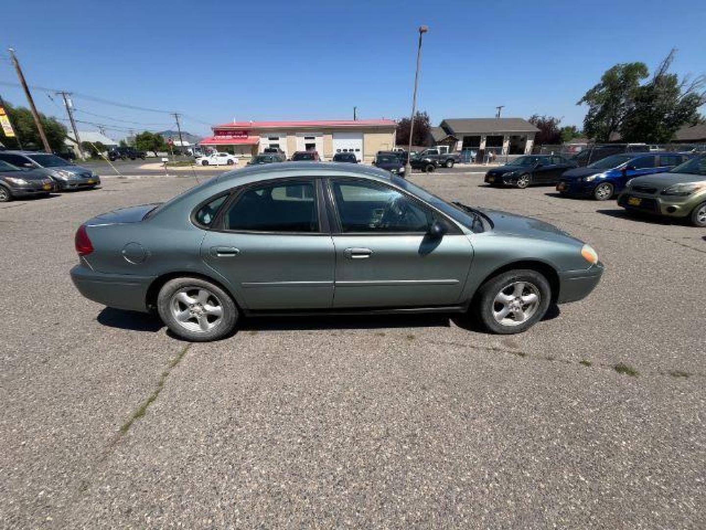 2007 Green Ford Taurus n/a (1FAFP53UX7A) with an 3.0 L engine, located at 1821 N Montana Ave., Helena, MT, 59601, 46.603447, -112.022781 - Photo#3